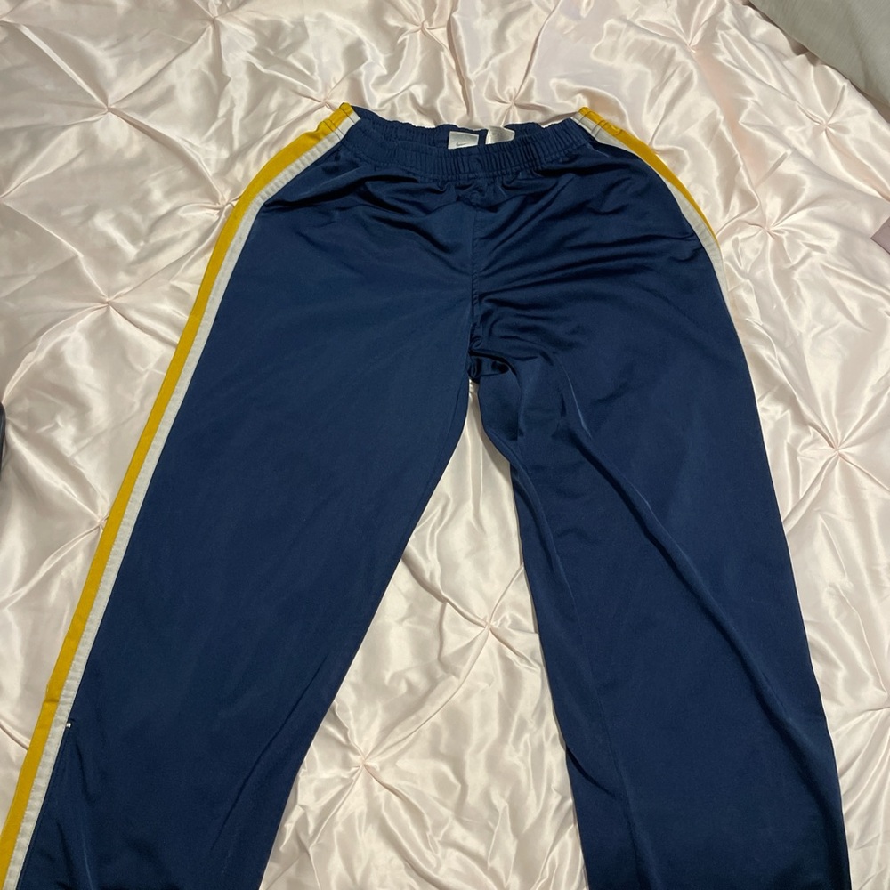 Nike Navy Blue Kids Track Pants with Yellow Stripe
